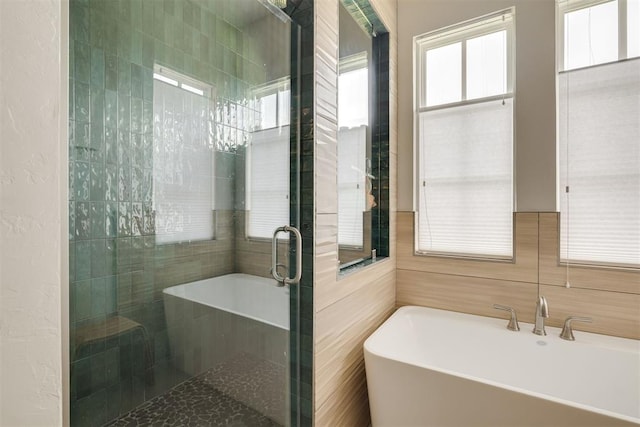 3824 Library Ln, Edmond, OK 73034 - full bath featuring tile walls, a freestanding bath, and a shower stall