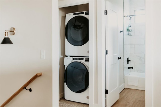 118900 S 4213th Rd, Eufaula, OK 74432 - laundry area with stacked washing machine and dryer and light wood-style flooring