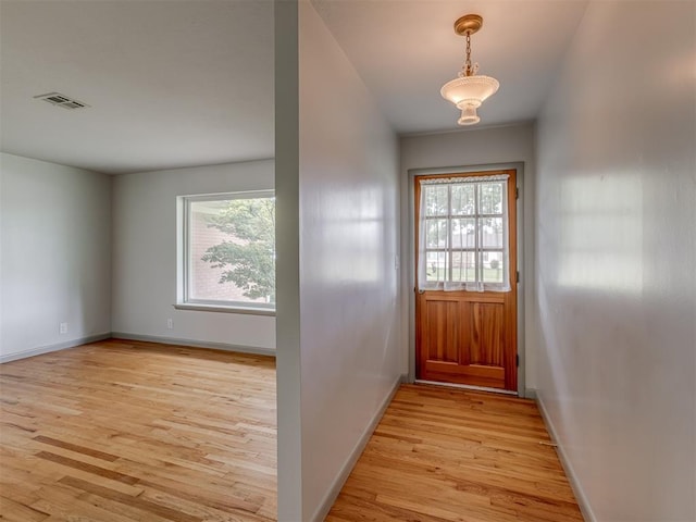 2822 N Market Ave, Shawnee, OK 74804 - doorway featuring light wood finished floors and baseboards