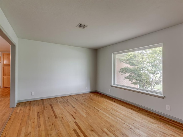 2822 N Market Ave, Shawnee, OK 74804 - empty room with light wood-style flooring and baseboards