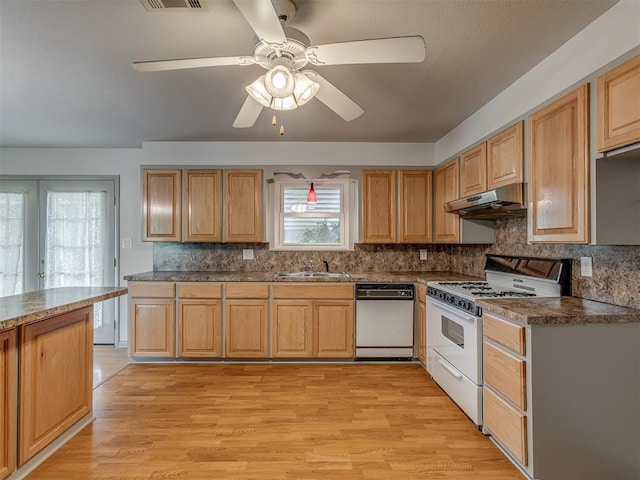 2822 N Market Ave, Shawnee, OK 74804 - kitchen featuring white appliances, under cabinet range hood, light wood-style flooring, a ceiling fan, and decorative backsplash