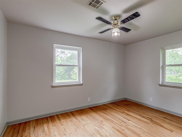 2822 N Market Ave, Shawnee, OK 74804 - empty room featuring light wood-style flooring and a ceiling fan