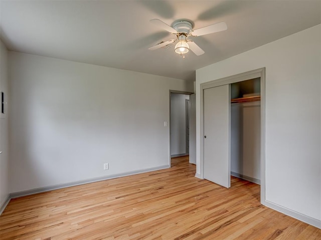 2822 N Market Ave, Shawnee, OK 74804 - unfurnished bedroom with a closet, light wood-style floors, and ceiling fan