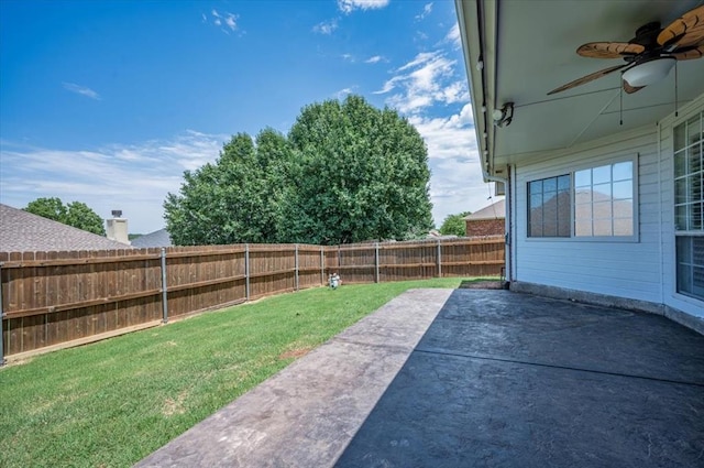 11517 Brighton Ct, Midwest City, OK 73130 - fenced backyard featuring ceiling fan and a patio