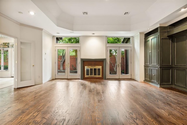 2825 NW Grand Blvd Unit 3, Oklahoma City, OK 73116 - unfurnished living room featuring french doors, healthy amount of natural light, wood finished floors, and recessed lighting