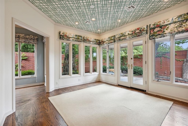 2825 NW Grand Blvd Unit 3, Oklahoma City, OK 73116 - unfurnished sunroom featuring french doors, crown molding, and wood finished floors