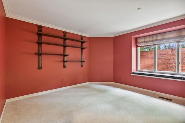 2825 NW Grand Blvd Unit 3, Oklahoma City, OK 73116 - carpeted empty room with baseboards and ornamental molding