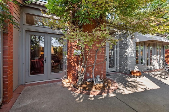 2825 NW Grand Blvd Unit 3, Oklahoma City, OK 73116 - entrance to property with french doors and brick siding