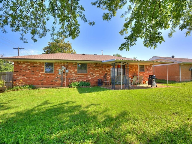 4021 E Larkwood Dr, Del City, OK 73115 - rear view of house featuring a patio and brick siding