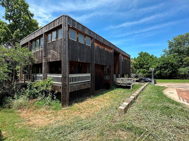 11413 Spring Creek Rd, Oklahoma City, OK 73162 - back of property featuring a lawn