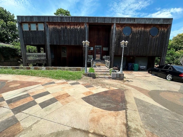 11413 Spring Creek Rd, Oklahoma City, OK 73162 - view of building exterior with a garage