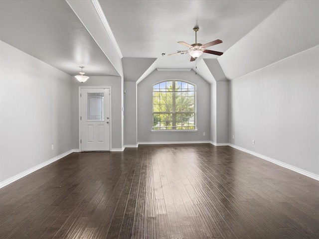 3325 NW 161st St, Edmond, OK 73013 - unfurnished living room featuring a ceiling fan, dark wood-style flooring, and lofted ceiling