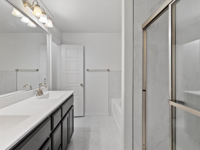 3325 NW 161st St, Edmond, OK 73013 - bathroom with double vanity, an enclosed shower, a bath, and marble look tiles