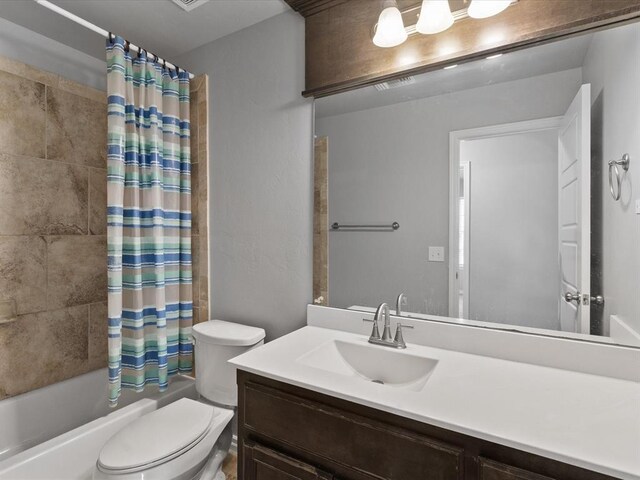 3325 NW 161st St, Edmond, OK 73013 - bathroom featuring vanity and shower / tub combo with curtain