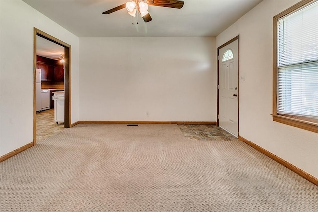 1817 W Harrison Ave, Guthrie, OK 73044 - empty room featuring light colored carpet and ceiling fan