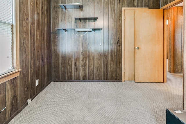 1817 W Harrison Ave, Guthrie, OK 73044 - spare room with carpet and wood walls