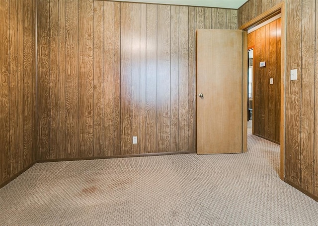 1817 W Harrison Ave, Guthrie, OK 73044 - carpeted empty room featuring wooden walls