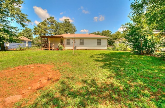 1817 W Harrison Ave, Guthrie, OK 73044 - back of property with a deck