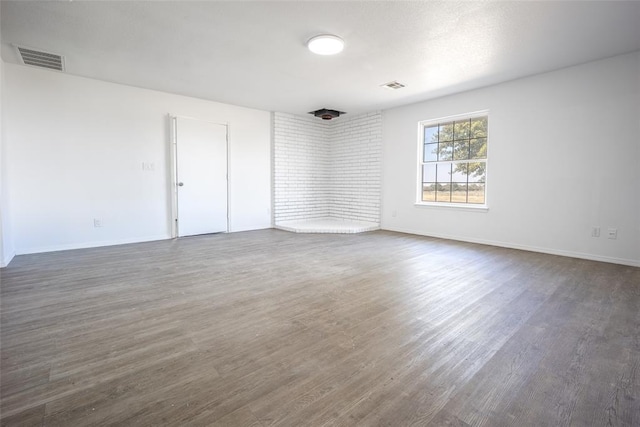 45350 Bob Crouch Rd, Tecumseh, OK 74873 - unfurnished room with dark wood-style flooring