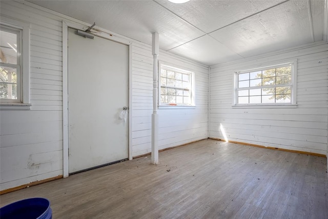 45350 Bob Crouch Rd, Tecumseh, OK 74873 - unfurnished room featuring wood finished floors and wooden walls