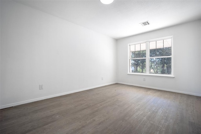 45350 Bob Crouch Rd, Tecumseh, OK 74873 - spare room with dark wood finished floors and baseboards