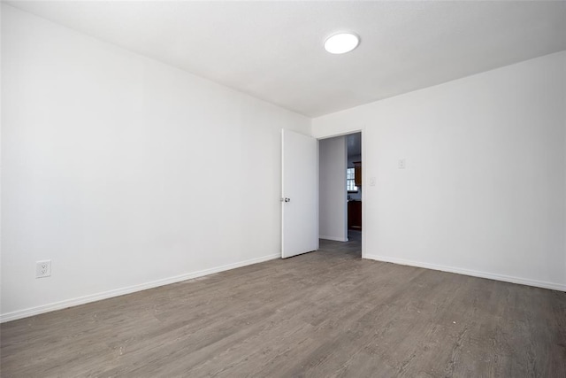 45350 Bob Crouch Rd, Tecumseh, OK 74873 - spare room with wood finished floors and baseboards