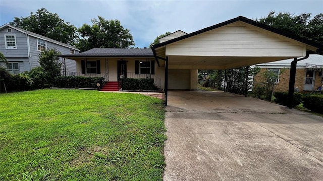425 Mohawk Dr, Pauls Valley, OK 73075 - view of front facade with covered porch, a carport, driveway, a front yard, and an attached garage