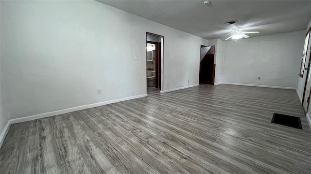 425 Mohawk Dr, Pauls Valley, OK 73075 - unfurnished living room with a ceiling fan and wood finished floors