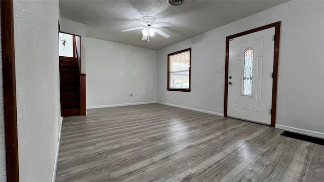 425 Mohawk Dr, Pauls Valley, OK 73075 - entryway featuring ceiling fan and wood finished floors
