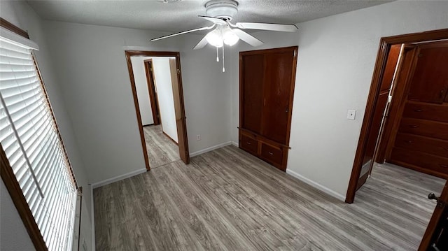 425 Mohawk Dr, Pauls Valley, OK 73075 - spare room with a ceiling fan, light wood-type flooring, and a textured ceiling