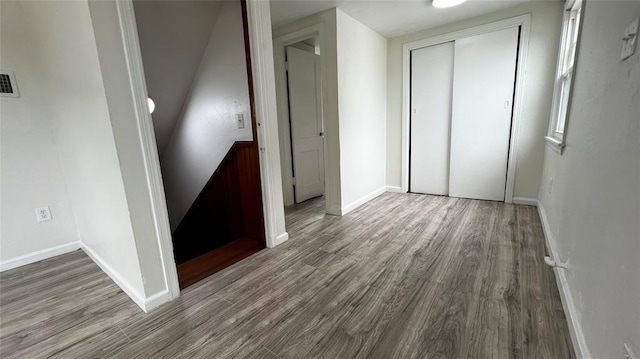 425 Mohawk Dr, Pauls Valley, OK 73075 - hallway featuring wood finished floors and baseboards