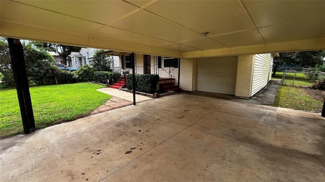 425 Mohawk Dr, Pauls Valley, OK 73075 - view of patio / terrace featuring concrete driveway and a carport