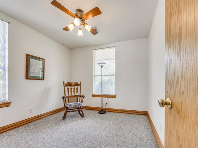 1124 Hill View Dr, Guthrie, OK 73044 - living area with carpet floors and a ceiling fan