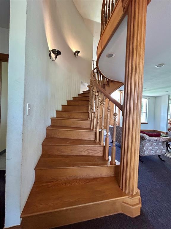 1124 Hill View Dr, Guthrie, OK 73044 - stairway with carpet floors