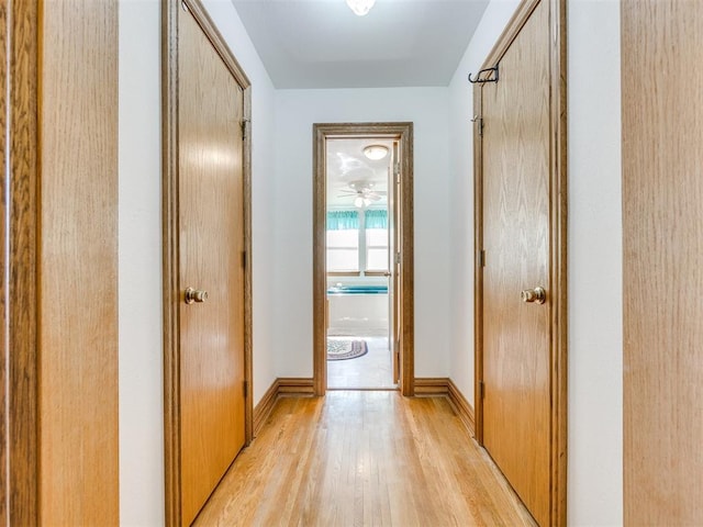 1124 Hill View Dr, Guthrie, OK 73044 - hall featuring light wood-style floors and baseboards