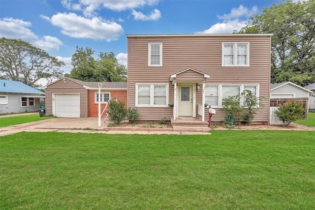 231 W Polk St, Mangum, OK 73554 - view of front of home featuring concrete driveway, a front yard, and a garage