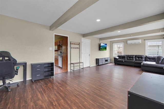 231 W Polk St, Mangum, OK 73554 - living area with a wall mounted air conditioner, beam ceiling, dark wood-type flooring, plenty of natural light, and recessed lighting