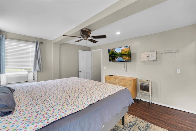 231 W Polk St, Mangum, OK 73554 - bedroom featuring dark wood-type flooring, heating unit, a ceiling fan, and recessed lighting
