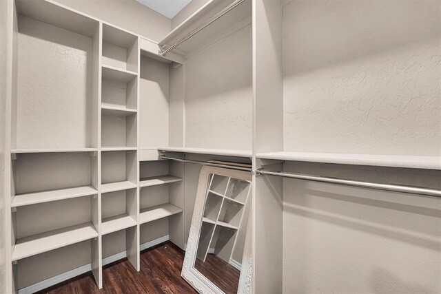 231 W Polk St, Mangum, OK 73554 - walk in closet featuring wood finished floors