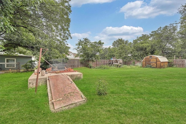 231 W Polk St, Mangum, OK 73554 - fenced backyard with a shed