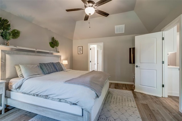 13420 Saltgrass Dr, Edmond, OK 73025 - bedroom featuring lofted ceiling, wood finished floors, and ceiling fan