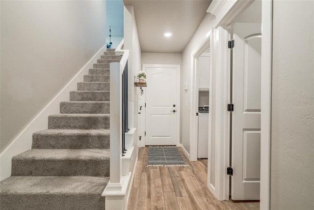 13420 Saltgrass Dr, Edmond, OK 73025 - staircase featuring wood finished floors and recessed lighting