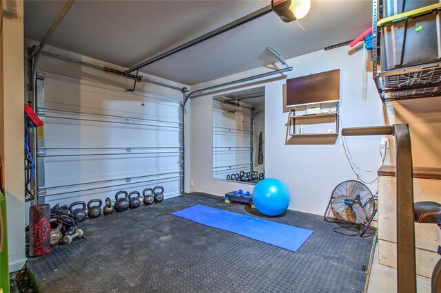 13420 Saltgrass Dr, Edmond, OK 73025 - workout room with a garage