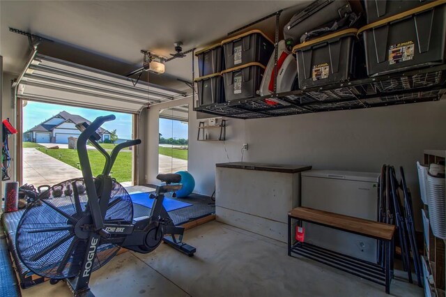 13420 Saltgrass Dr, Edmond, OK 73025 - garage featuring a garage door opener