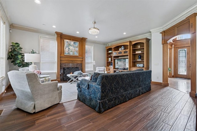 4609 Flint Ridge Dr, Norman, OK 73072 - living area featuring crown molding, dark wood finished floors, recessed lighting, and a fireplace