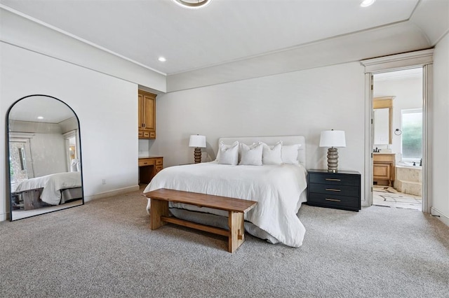4609 Flint Ridge Dr, Norman, OK 73072 - bedroom with light carpet, recessed lighting, and ensuite bathroom