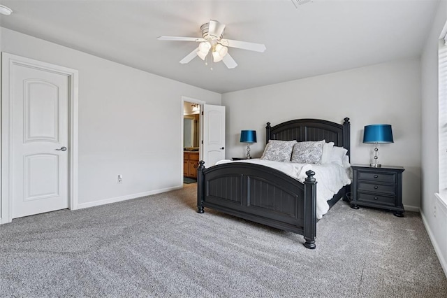 4609 Flint Ridge Dr, Norman, OK 73072 - carpeted bedroom with a ceiling fan and connected bathroom