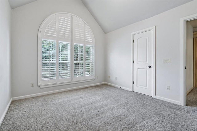 4609 Flint Ridge Dr, Norman, OK 73072 - unfurnished bedroom featuring carpet and lofted ceiling