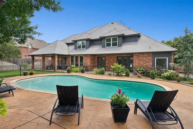 4609 Flint Ridge Dr, Norman, OK 73072 - view of swimming pool with a patio