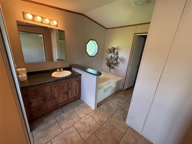339133 E 870th Rd, Chandler, OK 74834 - full bathroom featuring a textured ceiling, vanity, crown molding, a bath, and tile patterned flooring